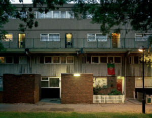 A closely cropped photograph of the Heygate Estate in London taken at night.